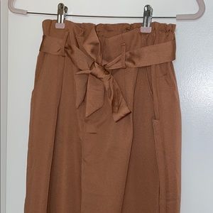 nude pink pleated high waisted pants